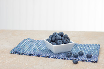 Fresh blueberries in square dish
