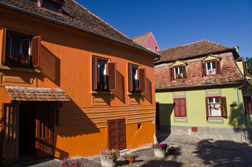 Old buildings in medieval city of Sighisoara (Transylvania)