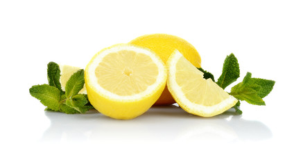 Three sliced lemons with mint isolated on a white background
