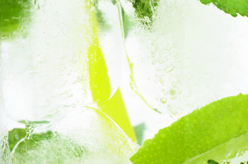 Icy background macro drink ice cubes mint limes