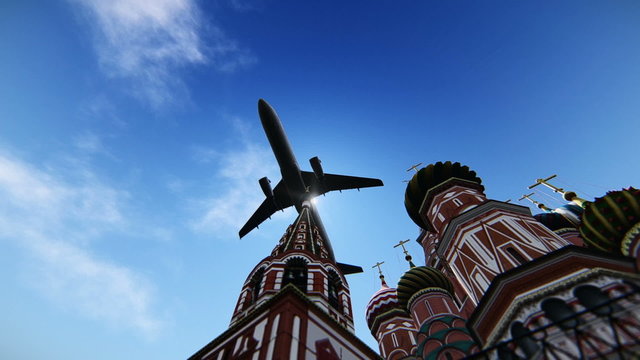 Plane passing at The Cathedral of Vasily the Blessed in Moscow