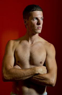 Young male model posing with bare chest