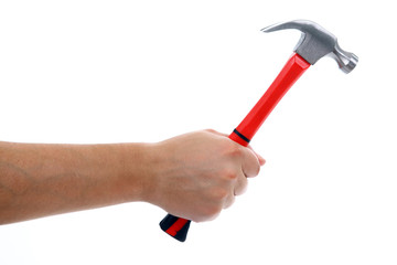 Hand holding a hammer