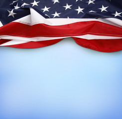 American USA stars and stripes flag on blue background. Copy space