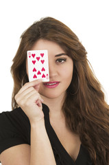 Beuatiful young woman playing cards
