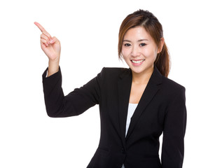 Businesswoman with finger point aside