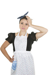 Pretty young housekeeper girl wearing apron