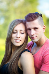 Fototapeta premium Happy smiling young couple outdoor