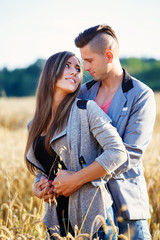 Happy smiling young couple outdoor