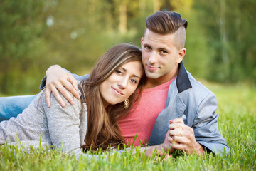 Happy smiling young couple outdoor