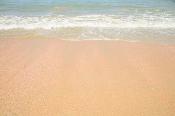 Fototapeta na wymiar Beach sand background. Wave and sand border.