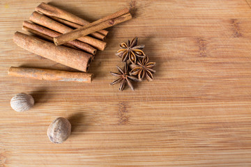 Macro picture of various autumn spices from top.
