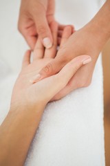 Obraz na płótnie Canvas Woman receiving a hand massage
