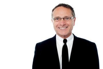 Smiling smart senior businessman