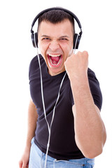 hadsome man with headphones showing success