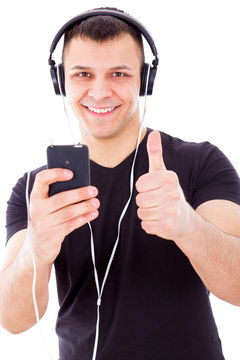 man with headphones listening music on mp3 player
