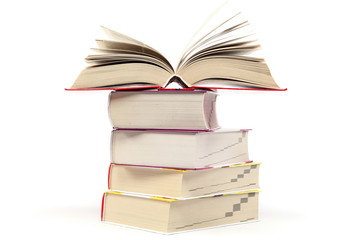 A stack of books on a white background.