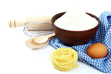 Supplies and ingredients for baking or making pasta.