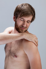Man with hurting arm