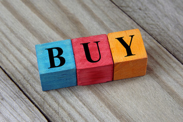 buy word on wooden colorful cubes