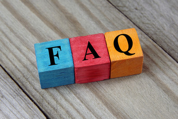 concept of FAQ word on wooden colorful cubes