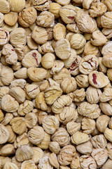 Background of peeled dried chestnuts