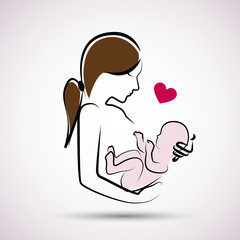 frau hält baby