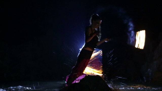 Artist turns the fiery fire-snakes fire performance