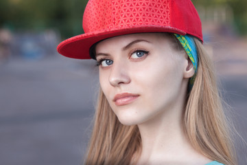 Closeup of young girl face in cap
