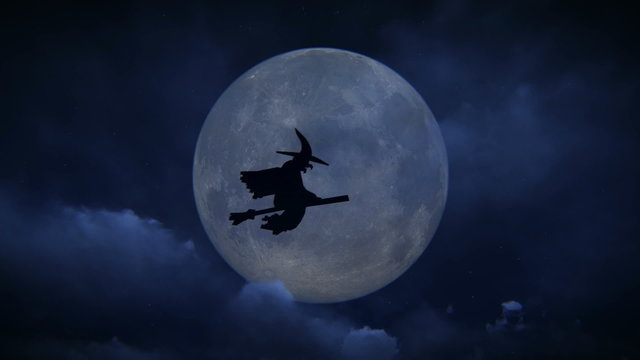 Halloween witch flying on her broom