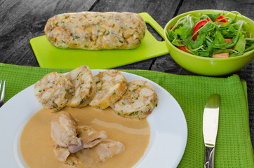 Chicken in cream sauce with dumplings