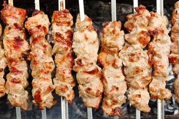 skewers with shish kebabs on brazier