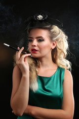Obraz premium Beautiful woman in retro style, on dark background