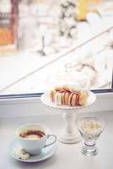 Coffee and sweets near the window
