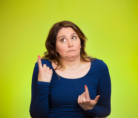 Confused, unsure which way to go in life, green background 