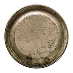 Aged metal texture in a round frame isolated white with clipping