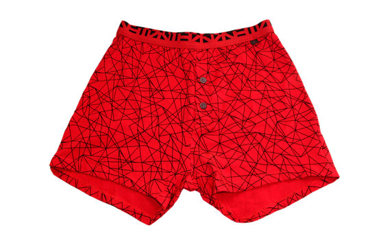 Men's red boxers briefs on the buttons on white background