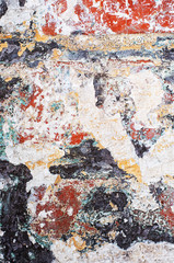 old brick wall with faded colors