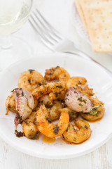 fried shrimps with garlic on plate