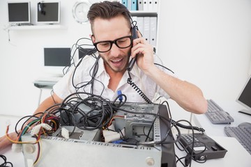 Angry computer engineer making a call