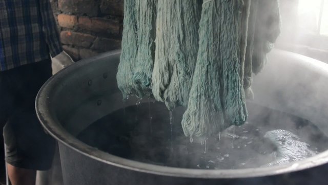 Wool dyeing in a carpet factory, Nepal