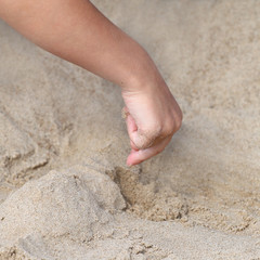 Hand with sand
