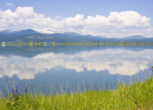 Pend Oreille River Reflection Of Clouds, Selkirk Mountains 