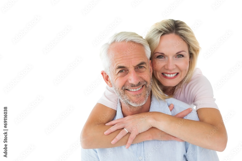 Aufkleber smiling couple embracing and looking at camera