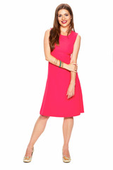 Full body portrait of smiling woman in red dress.
