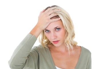 Fototapeta premium Confused young blonde looking at camera