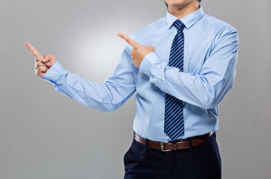 Businessman with two finger point up