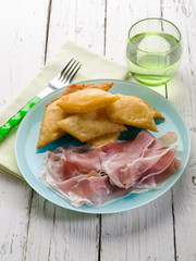 gnocco fritto with parma ham, traditional parma recipe