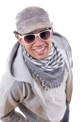 sexy man smiling in sweatshirt with sunglasses wearing cap and s