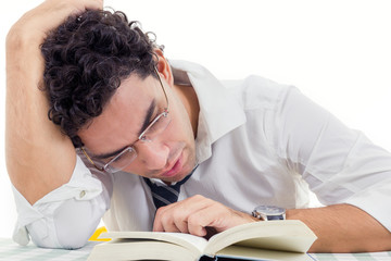 sleepy adult man with glasses in white shirt and tie sitting wit